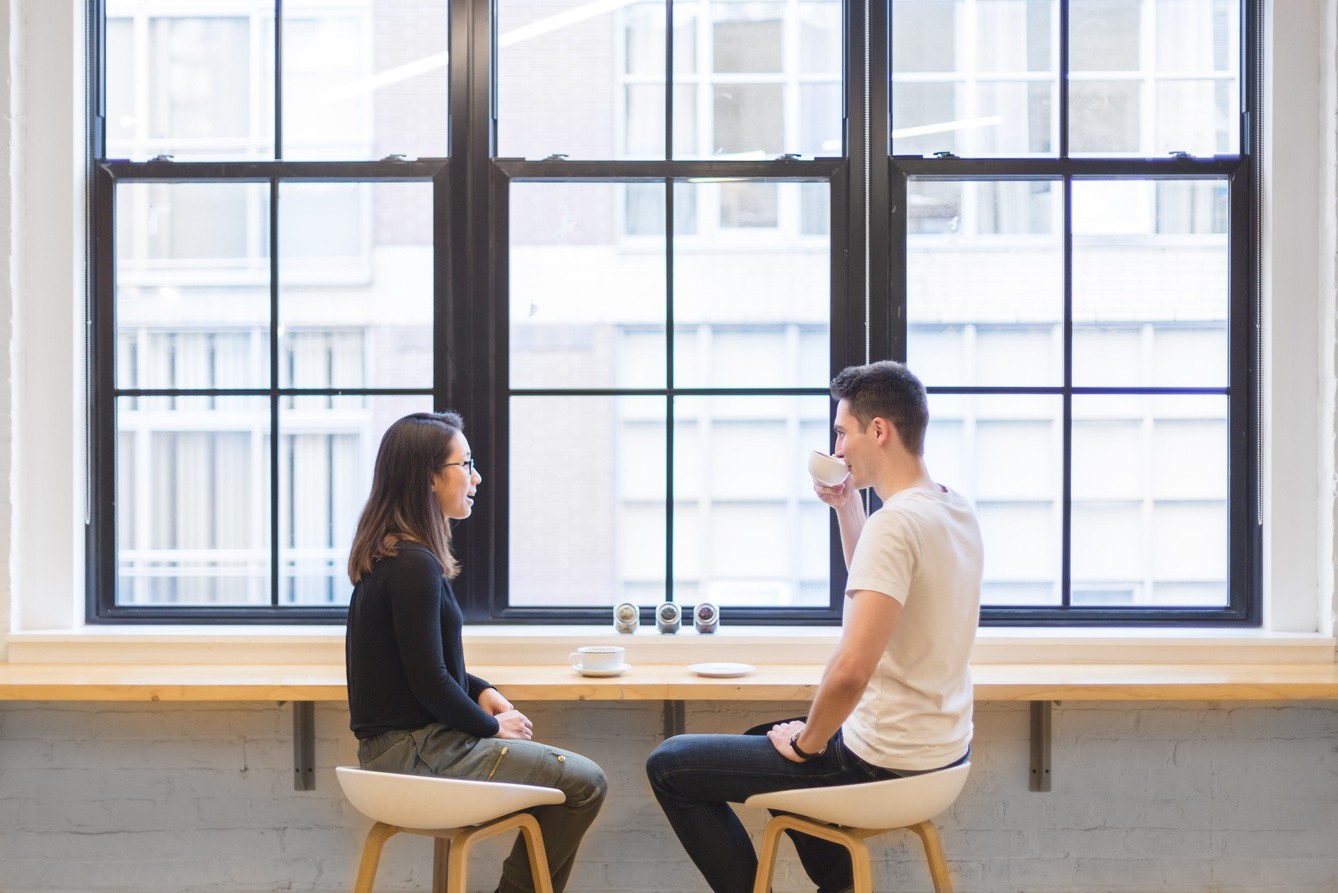 Couple Drinking Coffee Outdoors